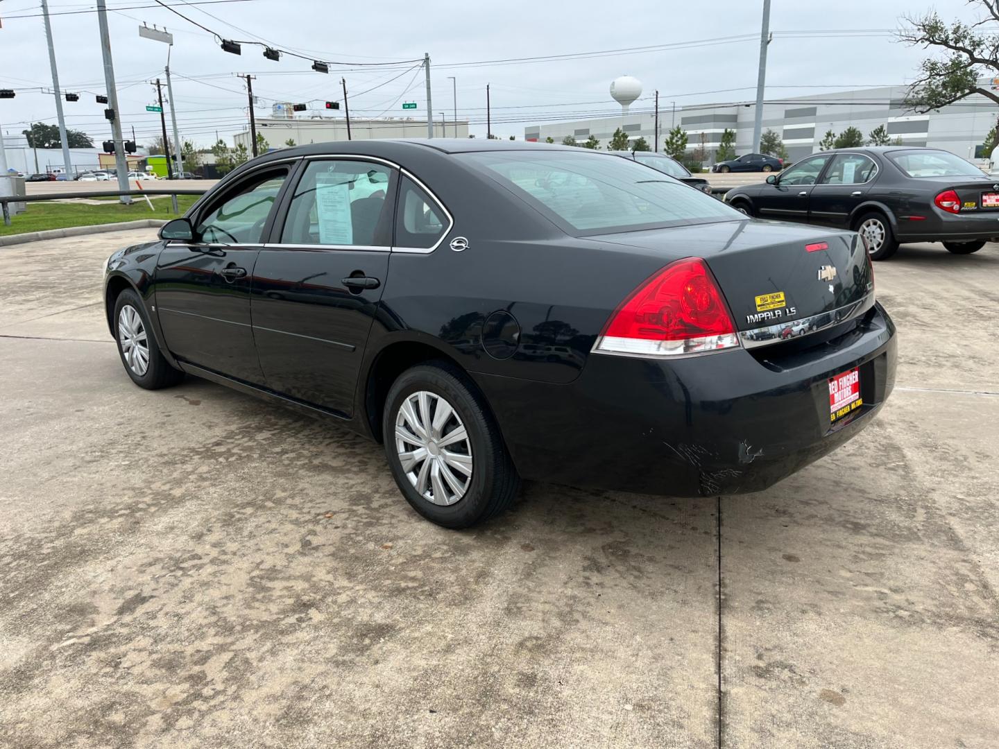 2008 Black /gray Chevrolet Impala LS (2G1WB55K381) with an 3.5L V6 OHV 16V FFV engine, 4-Speed Automatic Overdrive transmission, located at 14700 Tomball Parkway 249, Houston, TX, 77086, (281) 444-2200, 29.928619, -95.504074 - Photo#4